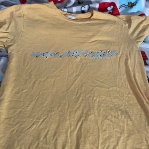 Plain yellow tee, with Hawaiian style turtles